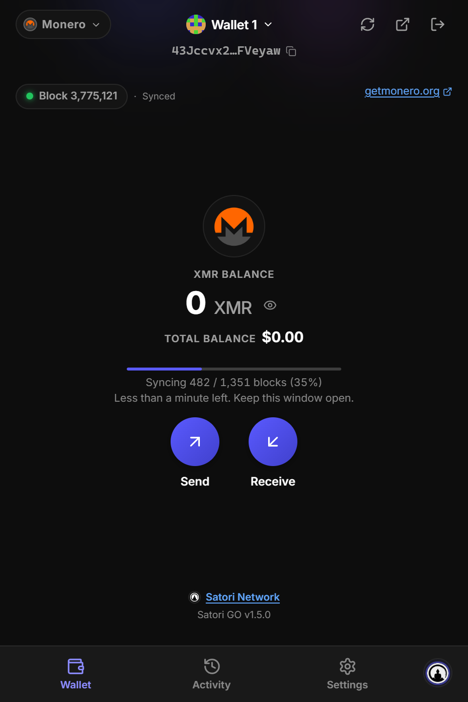 The Monero home screen during its first sync, with a progress bar and the time left